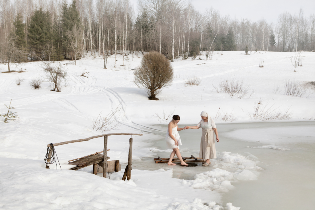 Taking a dip in ice water in Latvia.