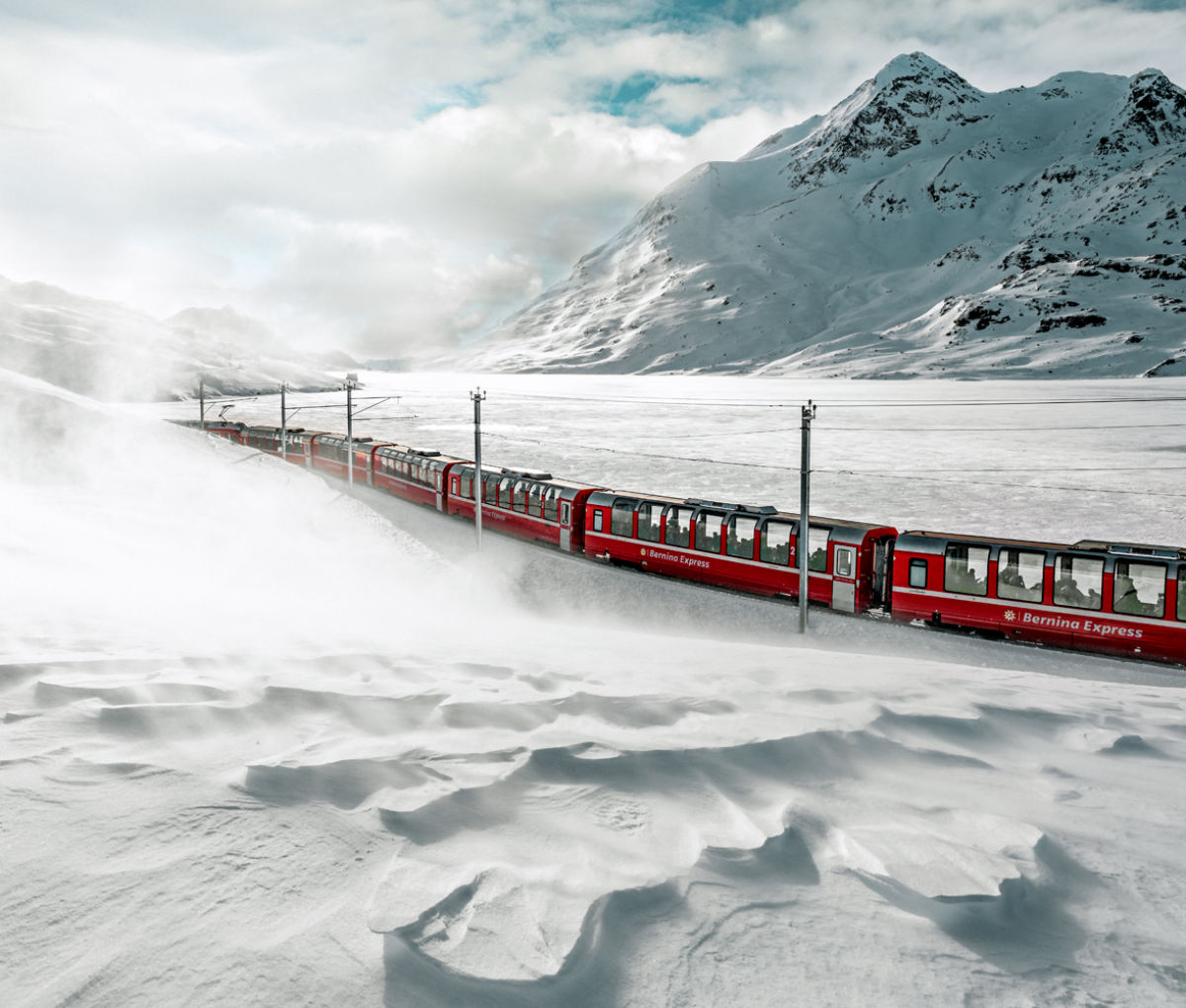 Bernina Express at Lago Bianco Grabunden, Switzerland in winter