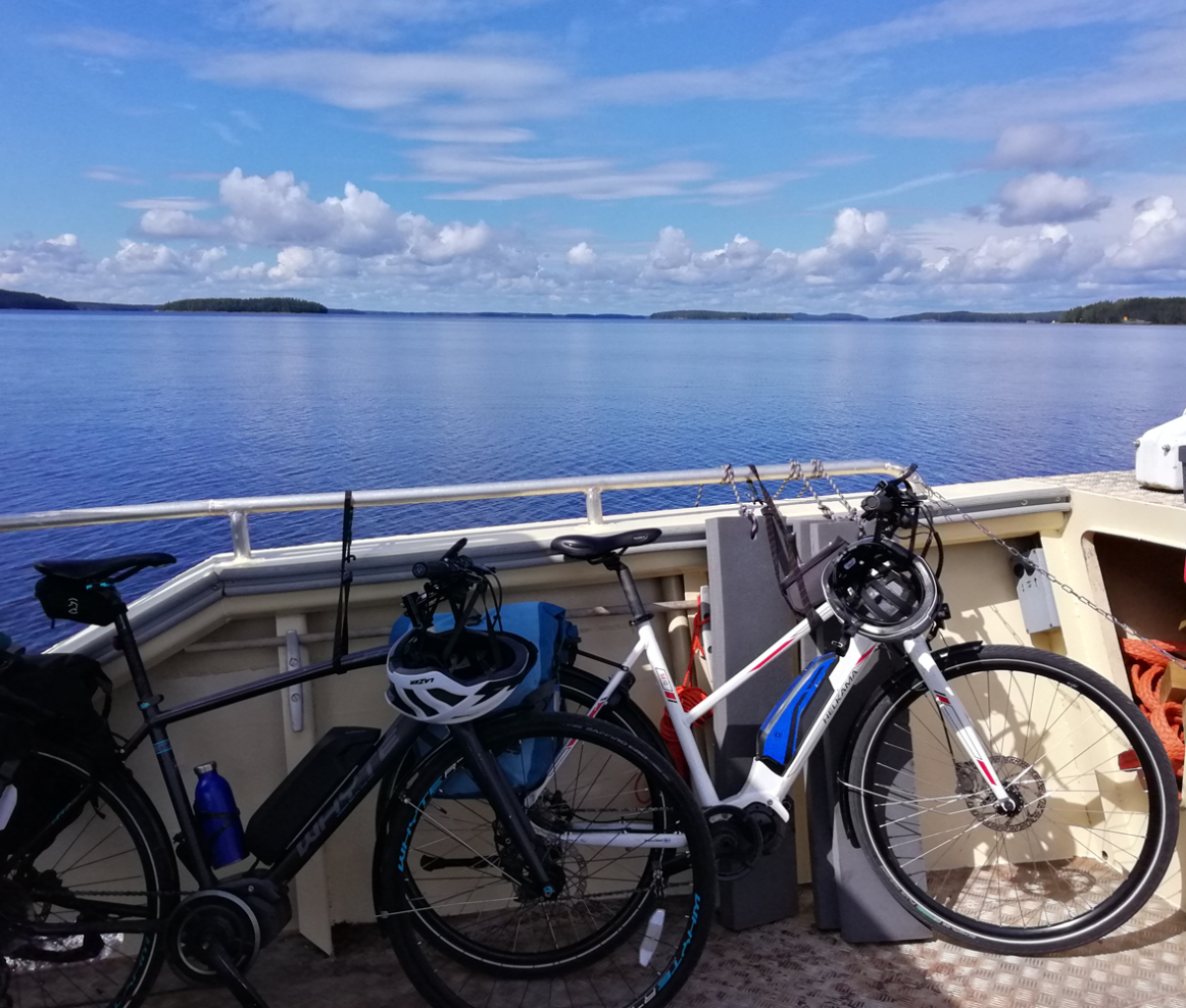 bikes on a ferry on a lake Finland Journeys 10Jan24